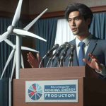 Realistic HD photo of an East Asian male politician announcing major policy changes for renewable energy production